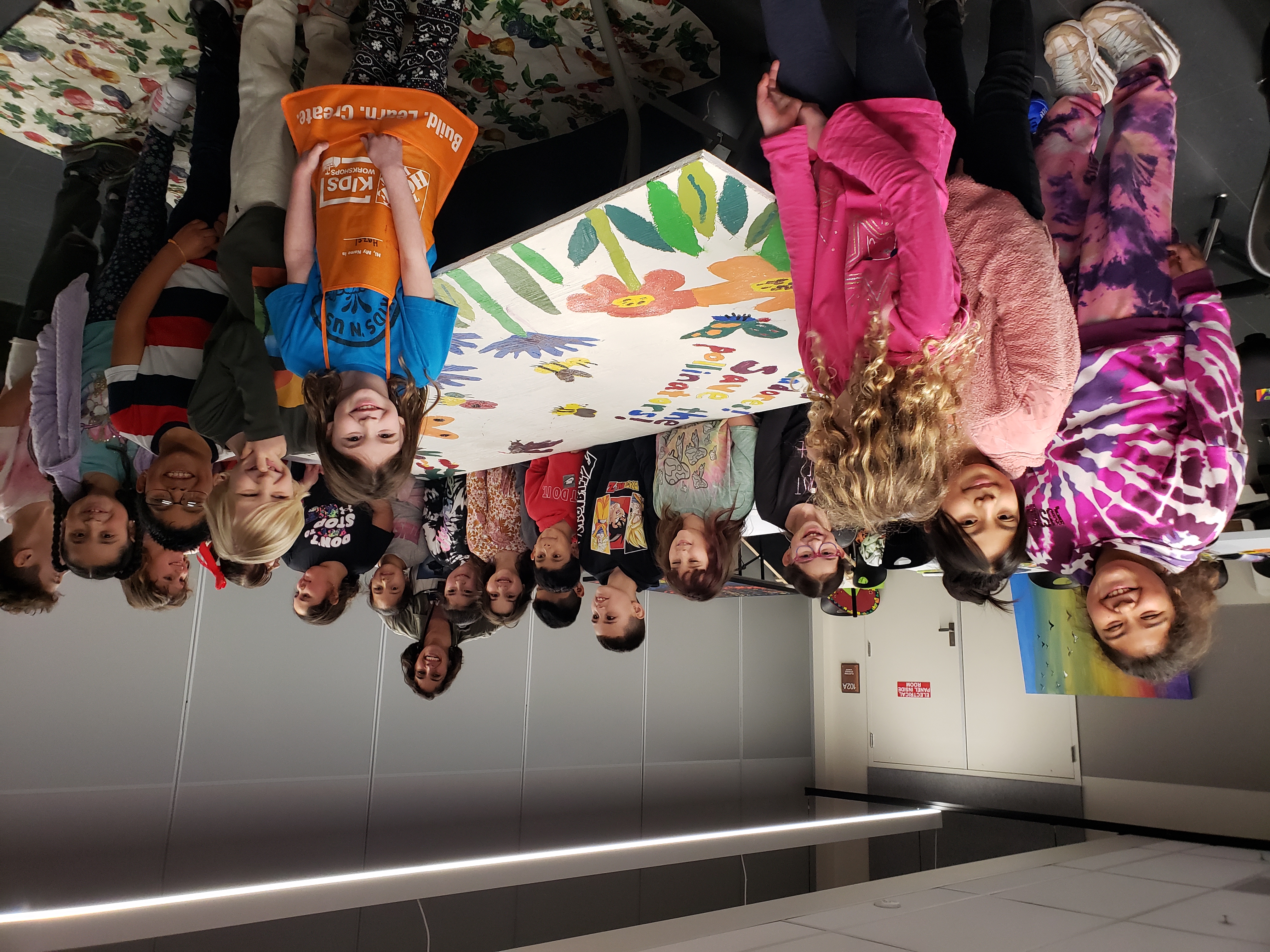 Madison students working on a mural