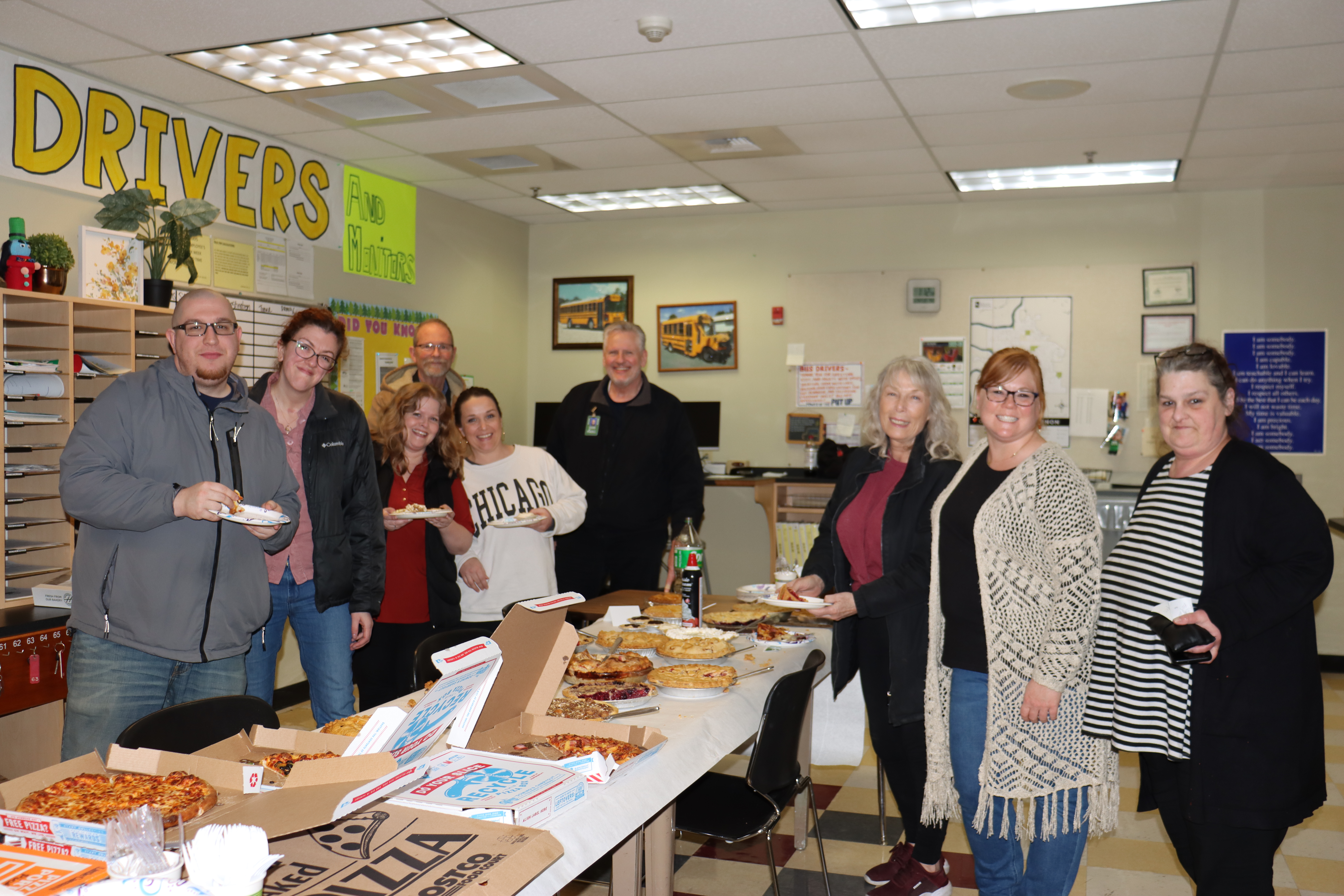 staff at transportation enjoying pie