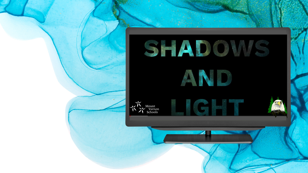 Shadows and light words on a screen