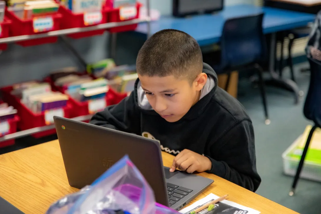 Students working on schoolwork.