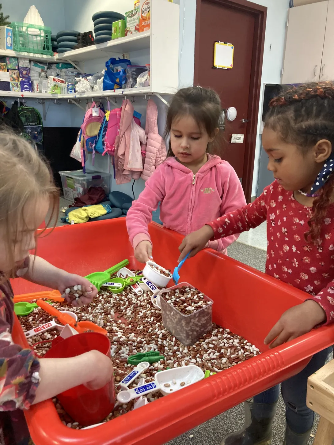 Transition to Kindergarten students working at a classroom table